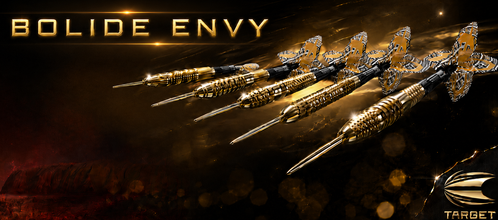 Gold darts labeled 'Bolide Envy' with Target logo on a dark background